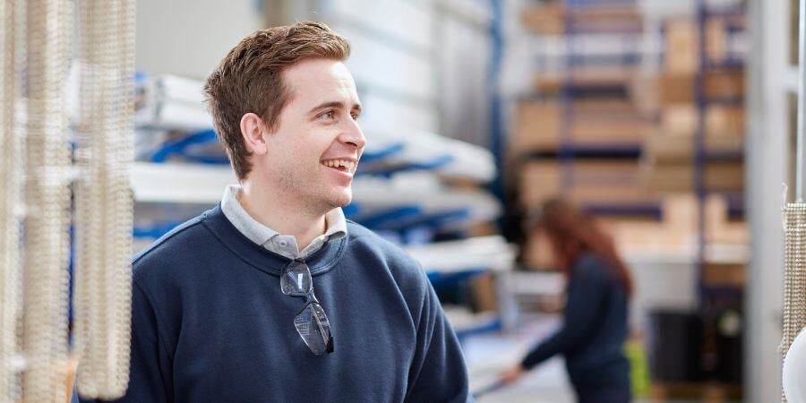 mid adult male worker in manufacturing factory