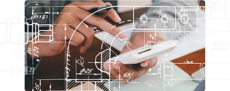 Calculator and notebook showing business planning